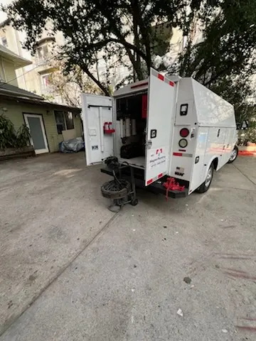 Magnet Plumbing service vehicle on-site for Water Heater Repair in Orchid